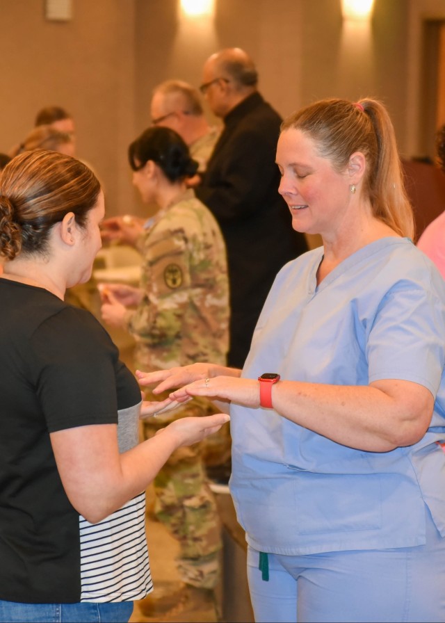 &#34;Blessing of the Hands&#34; Ceremony Honors Nurses at Womack Army Medical Center