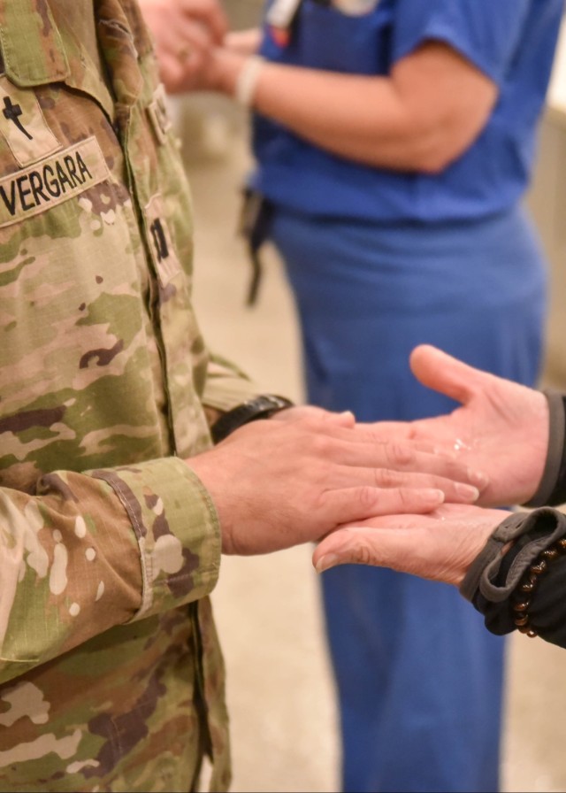 &#34;Blessing of the Hands&#34; Ceremony Honors Nurses at Womack Army Medical Center