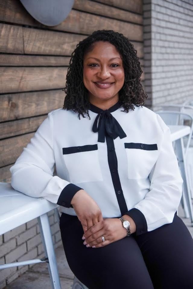 Erica Lewis, Redstone school liaison officer, informs families about public, private and home-based school options in the area, resources available to them, depending on the needs of their school-age children, and after-school programs provided...