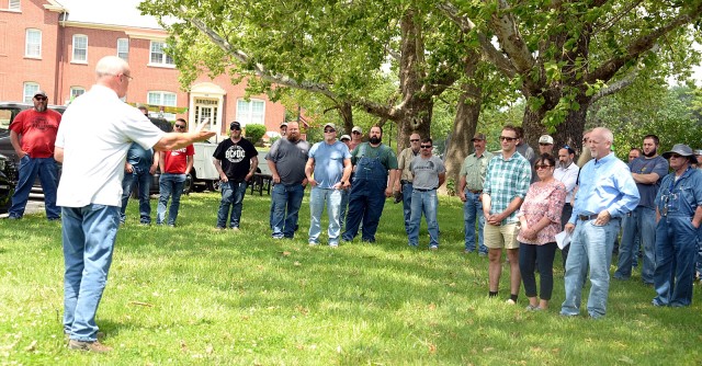 Directorate of Public Works Chief of Operations Jerry Clark addresses Cody Clark’s brother Patrick, mother Lori and father James, as well as several DPW employees and Garrison staff members, during the dedication ceremony for the Cody Clark...