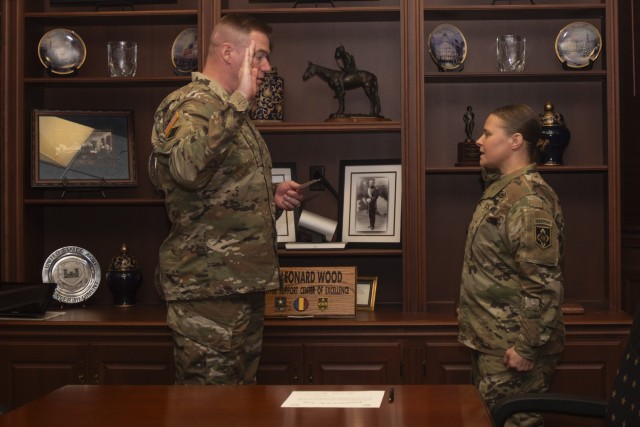 Maj. Gen. Christopher Beck, Maneuver Support Center of Excellence and Fort Leonard Wood commanding general, swears in Lt. Col. Crystal Batey as the MSCoE and Fort Leonard Wood Command Inspector General during a May 28 ceremony in the MSCoE...