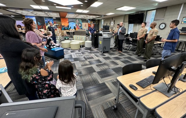 Jacob Mills’ father, Ian Tarasevich, a retired Army colonel with 27 years of service, expresses his pride in Jacob and Liam for taking initiative and demonstrating what being a good friend and a good citizen looks like. (U.S. Army photo by Anne...