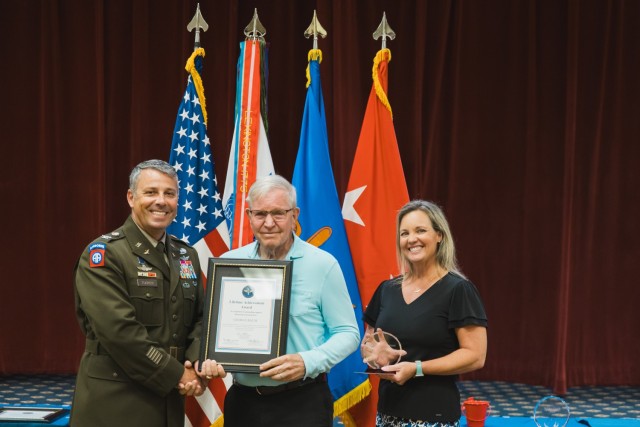 George Baum is presented with the Lifetime Achievement award on May 31 in The Landing.