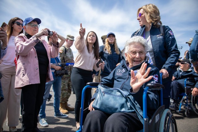 WWII veteran Anna Mae Krier waves at the camera during her arrival to Normandy for the 80th Anniversary of D-Day on June 3, 2024, at Deauville-Normandie Airport, Deauville, France. The arrival of the WWII veterans to Normandy for the 80th...