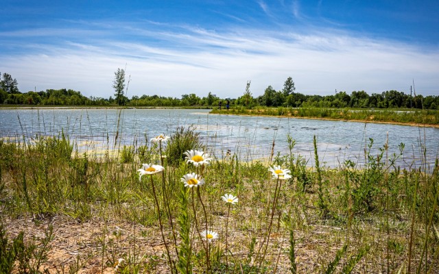 Two individuals fish at Fort Knox’s Castle Lake May 31, 2024. The lake opened May 11, after being constructed by 19th Engineer Battalion in partnership with the Natural Resources Branch.