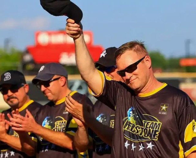 COL Brian Cozine is introduced at the 2023 Community Softball Game.