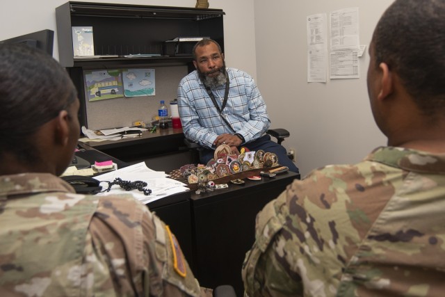 Dwight Wilson, the Human Resources Services Branch chief for Fort Leonard Wood’s Directorate of Human Resources, speaks with Soldiers May 28 in Bldg. 470. Wilson retired from the Army after 23 years of service as a combat engineer, and he used...