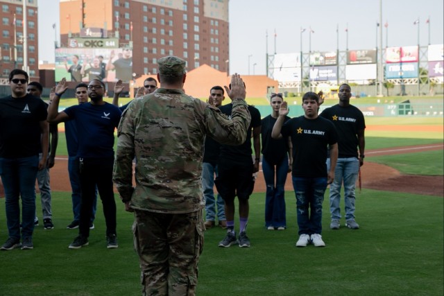 Battalion commander administers oath of enlistment at OKC baseball game