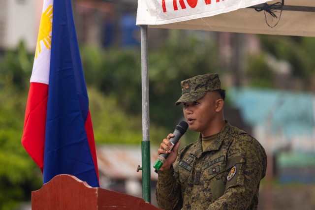 U.S. Army divers with the 7th Engineer Dive Detachment, 84th Engineer Battalion, 130th Engineer Brigade, 8th Theater Sustainment Command, participate in the closing ceremony of the Basco Port clearance operations with the Armed Forces of the...