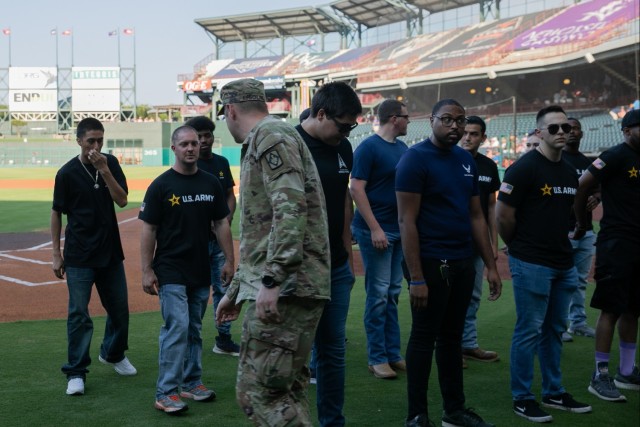 Battalion commander administers oath of enlistment at OKC baseball game