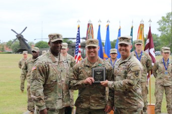 The rewards match the effort: Aviation platoon sergeant 'wrestles' his way to USAACE NCO of the Year