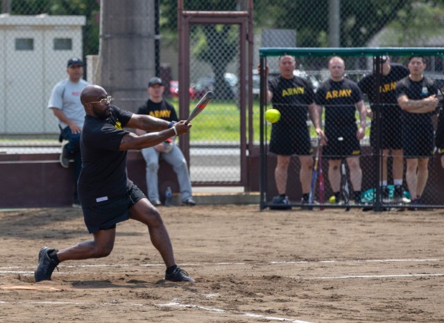 Officers and enlisted Soldiers compete in a softball game during Army Week festivities at Camp Zama, Japan, June 12, 2024. Personnel across U.S. Army Japan celebrated the Army’s 249th birthday with some friendly competition in various sports...