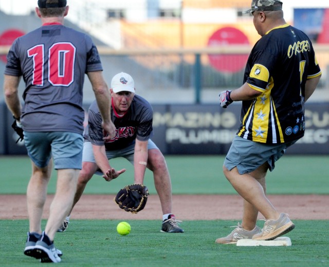 Madison Mayor Paul Finley makes a play at shortstop for the North Alabama Rockets during their 21-13 win over Team Redstone.