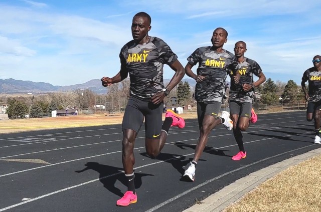 Sgt. Anthony Rotich, Capt. Samuel Chelanga, Spc. Benard Keter and Staff Sgt. Leonard Korir, World Class Athlete Program, Fort Carson, Colorado, run 4 X 400s during track and field training March 12, 2024. (U.S. Army photo by Shannon Collins)