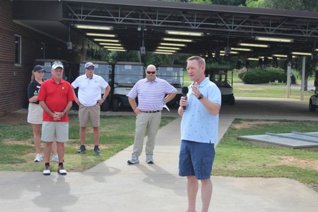 Garrison Commander Col. Brian Cozine addresses the 92 golfers before the AUSA Iron Mike tournament June 19 at the Links.
