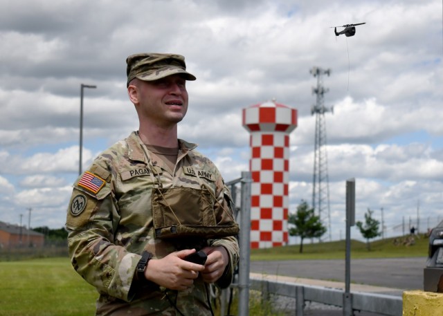 U.S. Army Spc. Johnny Pagan, an infantryman with the New York National Guard's 1st Battalion, 69th Infantry Regiment, controls a soldier-borne sensor unmanned aerial vehicle in Fort Drum, N.Y., June 27, 2024. The system is portable and can be controlled by a single Soldier, allowing the drone to complete dangerous work Soldiers usually perform. (U.S. Army photo by Master Sgt. Warren W. Wright Jr., 42nd Infantry Division Public Affairs)