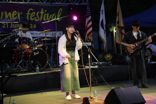 The K-16 Air Base community celebrated their annual "Summer Fest" on June 21. Soldiers and civilians came together to enjoy live performances by local bands and groups, games, and food. (U.S. Army photo Pfc. Caelum Astra)