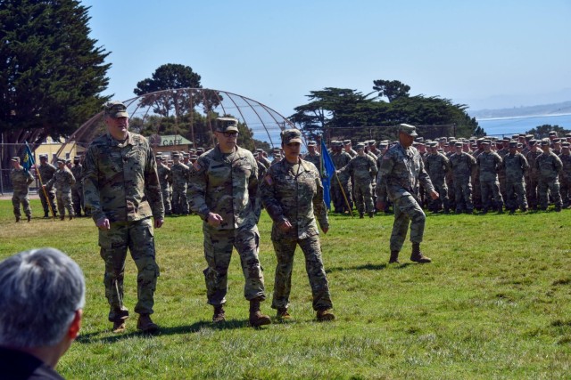 Col. James Kievit, Maj. Gen. Richard Appelhans and Col. Christy Whitfield finish their inspection of the troops during the change of command ceremony held at the Presidio of Monterey July 2, 2024.