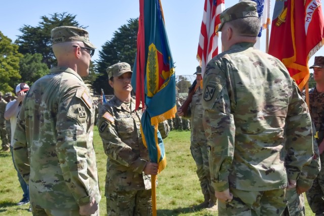 Col. Christy Whitfield accepts the DLIFLC guidon, a symbol of command, during a change of command ceremony, held at the Presidio of Monterey July 2, 2024.