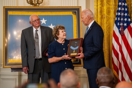 President Joe Biden presents the Medal of Honor for U.S. Army Pvt. George D. Wilson to Theresa Chandler, Wilson’s great-great-granddaughter, during a Medal of Honor ceremony at the White House in Washington, D.C., July 3, 2024....