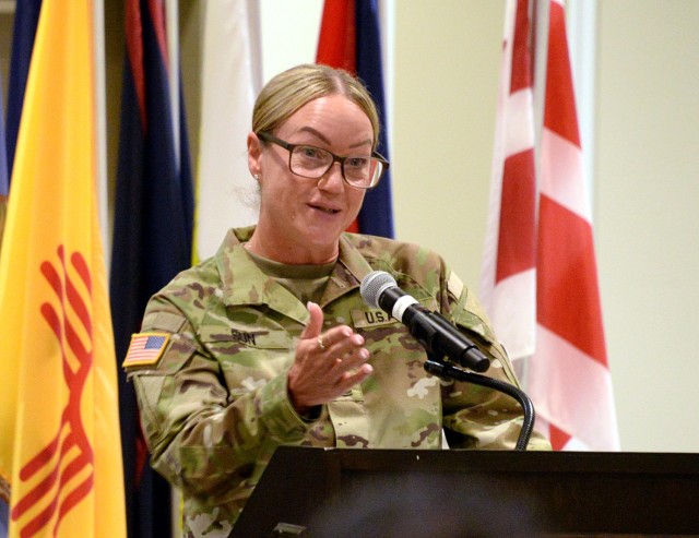 Incoming Garrison Command Sgt. Maj. Vanessa Sun thanks outgoing Garrison Command Sgt. Maj. Erika Rhine-Russell for her service and wishes her well during the Garrison change of responsibility ceremony June 28, 2024, at the Frontier Conference...