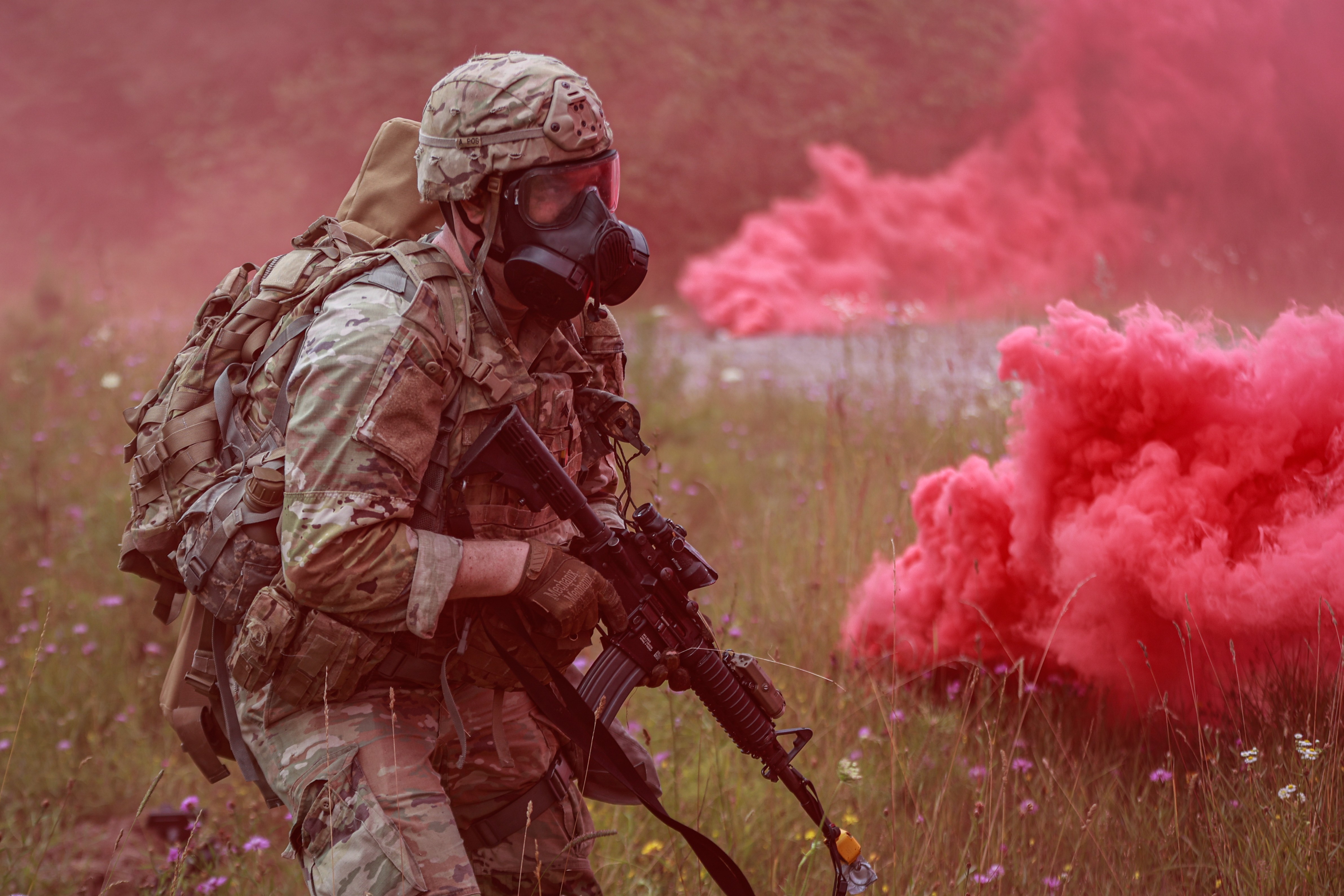 U.S. Army Sgt. Noah Cumming, 18th Military Police Brigade, patrols through simulated CS gas during battle drills for the 21st Theater Sustainment Command Best Squad Competition on Camp Aachen, Grafenwoehr, Germany, on July 10, 2024. Day three of...