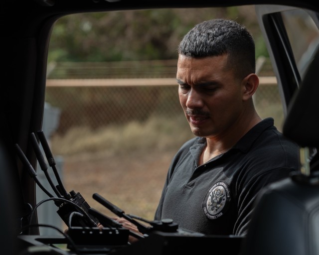 U.S. Army Sgt. 1st Class Daniel F. Billingsley, communications chief, 33rd Weapons of Mass Destruction-Civil Support Team, tests radio transmissions during a training exercise in Lihue, Hawaii, June 7, 2024. The exercise included military and...