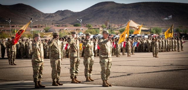 Col. Steven L Chadwick, the National Training Center Chief of Staff, salutes the official party after presenting the command for the inspection of troops at the 18 June 2024 NTC assumption of command ceremony.