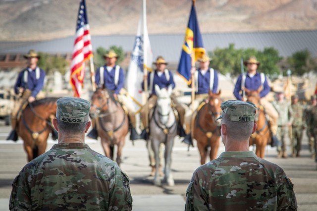 The 11th ACR Horse Detachment presents the U.S. Flag and organizational colors as Lt. Gen. Stephen G. Smith, the Deputy Commanding General of U.S. Army Forces Command, officiates the 24th assumption of command of the U.S. Army National Training...