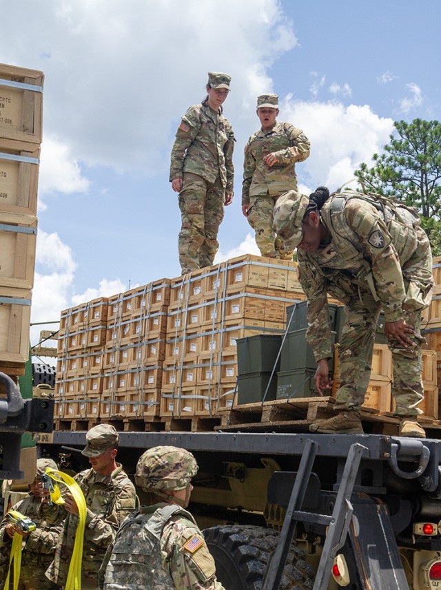 Soldiers assigned to the 53rd Brigade Support Battalion prepared to unload ammunition they have just transported from an ammunition supply point to an ammunition holding area at Camp Shelby, Mississippi, July 15, 2024. These Soldiers are among...