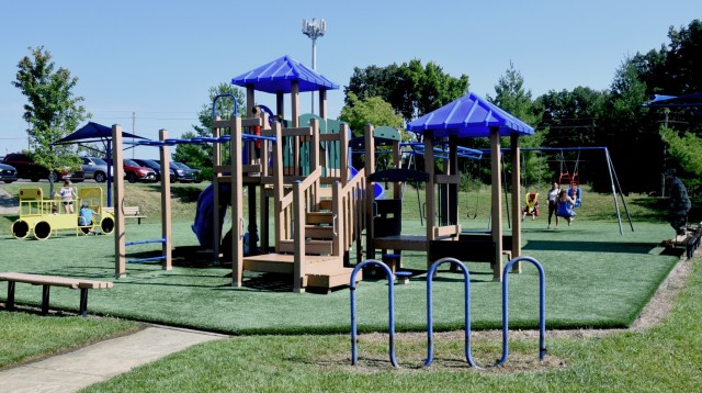 Military chidren enjoy the new inclusive playground July 18, 2024, on Fort Knox, Kentucky. It includes specialized turf, swing and interactive games.