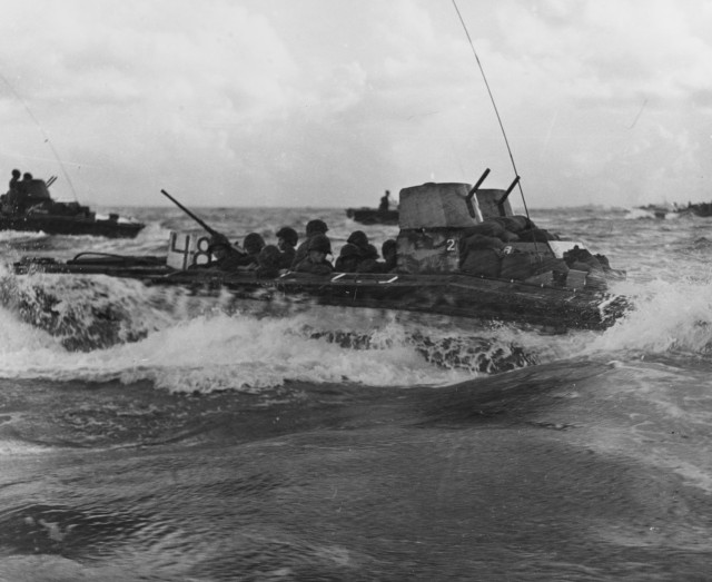 LVT carrying assault troops from Saipan to Tinian. More than half of the 140 LVTs used to Land the assault force were crewed by the U.S. Army. The Tinian invasion is the only major amphibious assault to be launched from land by LVTs that...