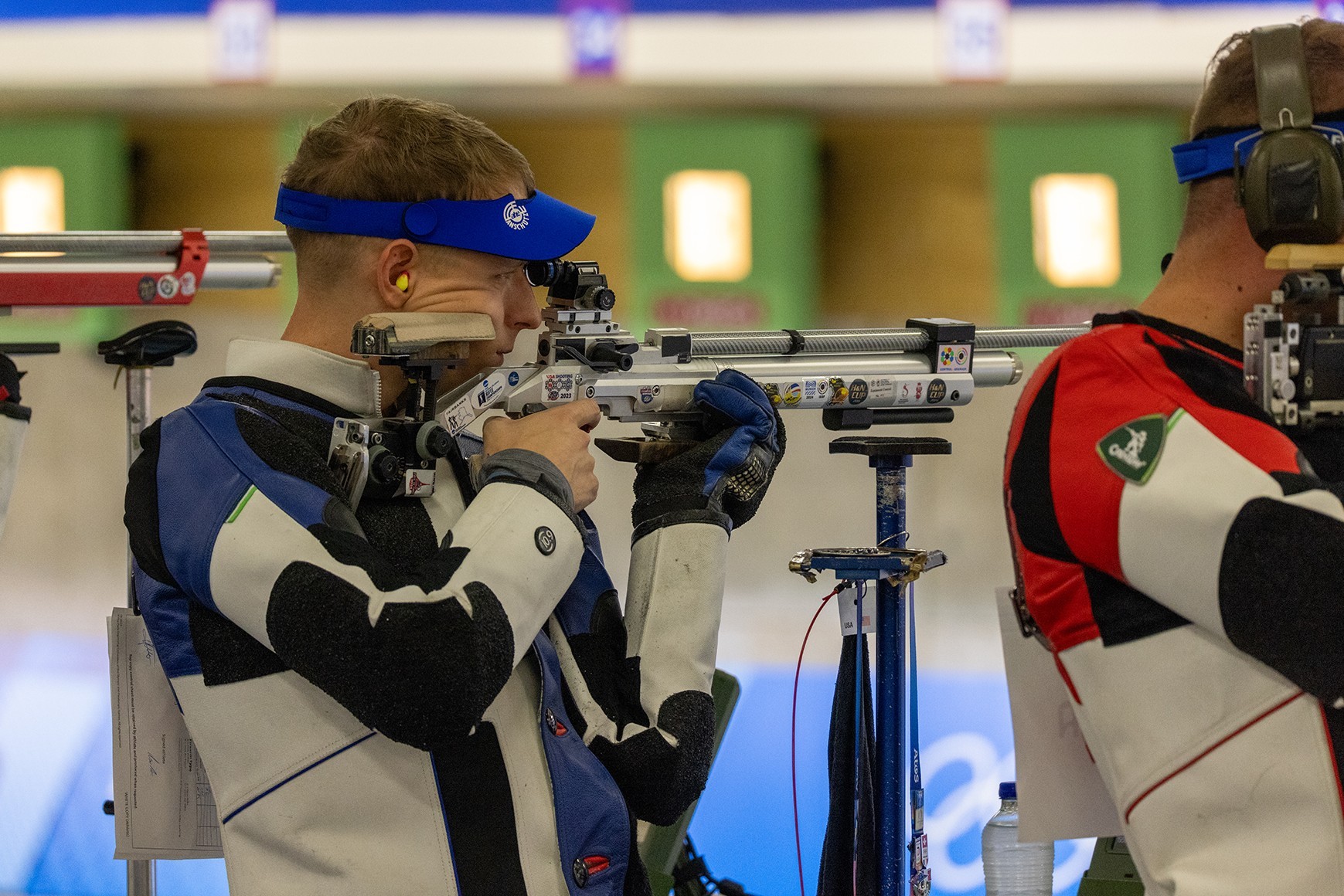 Army Sgt. Ivan Roe prepares to aim at a target during the men’s 10-meter air rifle during a Summer Olympics competition in Chateauroux, France, July 28, 2024.