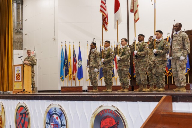 Col. Ned Holt, left, commander of the 10th Support Group, provides remarks during a reflagging ceremony inside Kizuna Hall at Camp Zama, Japan, July 31, 2024. The ceremony signified the 35th Combat Sustainment Support Battalion&#39;s transition to...