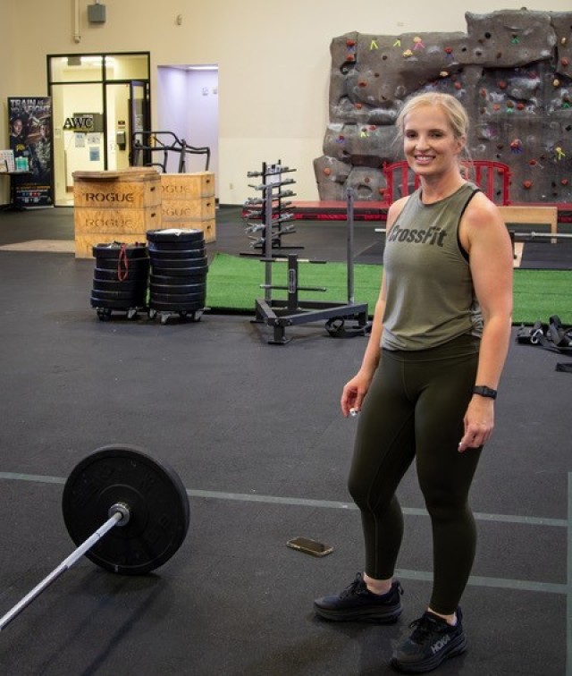 Rotational visitor Capt. Martha Lane-Kinnett, an Aide De Camp with 3rd Infantry Division, conducts PT at the Box Gym; one of the several R2 facilities available at the Fort Irwin Army Wellness Center.