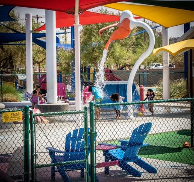 Military children are drenched by water attractions as they beat the heat by enjoying the Fort Irwin Splash Park on 2nd Street; one of the several R2 facilities available on Fort Irwin.