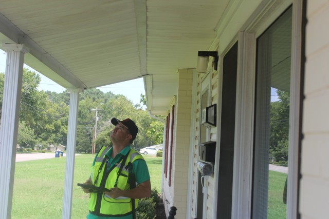 Sheldon “Mitch” Mitchell, an inspector with RER Solutions, inspects a Redstone home Aug. 1.
