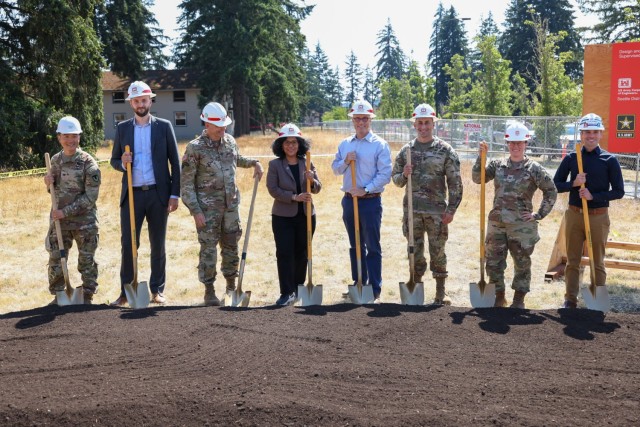 U.S. Army leaders from Joint Base Lewis-McChord stand with representatives from Washington State and plant shovels in the dirt signifying the start of construction of new barracks for Soldiers across JBLM, August 7, 2024, Joint Base Lewis-McChord,...