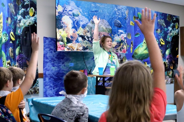 VBS volunteer Stephanie Reves leads a class of third graders in the “Imagination Station,” where children were asked to test their creativity, during Vacation Bible School Aug. 6 at Pioneer Chapel. During the session, children learned ocean...