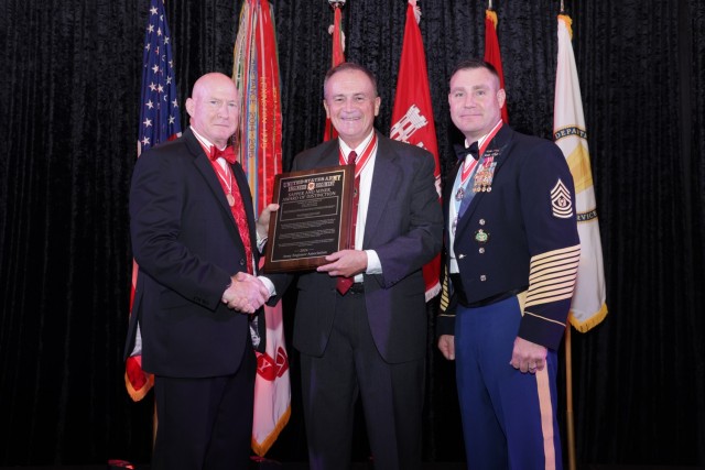 People are honored at the annual castle ball for their services to the Pioneer Regiment