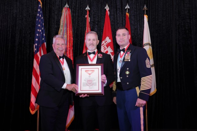 People are honored at the annual castle ball for their services to the Pioneer Regiment