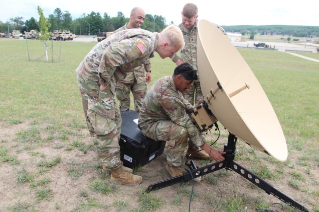 Advisors from Brigade and Force Package 25-1 work to  ensure communication platforms are established prior to NS24 execution