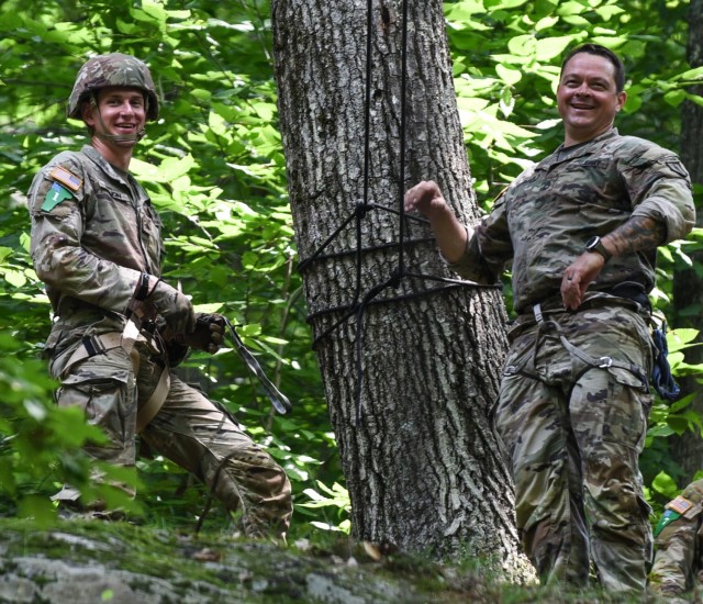 NewYork Army National Guard Sgt. Peter Fillion, an Amherst resident who won the Army National Guard Best Warrior competition in the Soldier category, prepares to traverse a rope bridge during the National Guard’s 2024 National Best Warrior Competition Aug. 4, 2024, at the Ethan Allen Firing Range near Jericho, Vermont. Cadre from the Army Mountain Warfare School supported the event, which included tackling a rope bridge, ascending a cliff face with a Prusik knot and rappelling. In total, 14 Soldiers and noncommissioned officers from 13 states competed to be named the National Guard’s top Soldier and NCO.