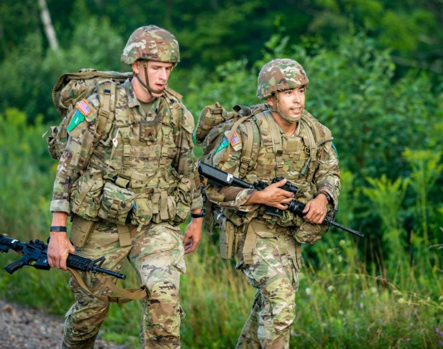 New York Army National Guard Sgt. Peter Fillion, left, anAmherst resident who won the Army National Guard&#39;s Best Warrior competition in the Soldier Category,  and Spc. Andruw Nakamura, right, an infantryman assigned to  the Hawaii Army National Guard, participate in the second ruck march event during the 2024 Army National Guard Best Warrior Competition at the Army Mountain Warfare School, Jericho, Vermont, Aug. 5, 2024. The Army National Guard Best Warrior Competition is a five-day event composed of 14 competitors representing the regional winners; the competition tests Soldiers’ physical and mental prowess with a series of events with the overall winners receiving either Soldier of the Year or Non-commissioned Officer of the Year recognition.