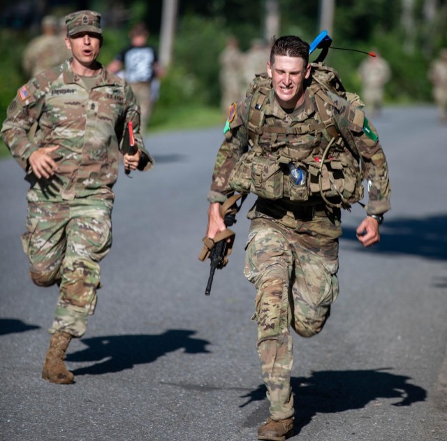 New York Army National Guard Sgt. Peter Fillion, who won the 2024 Army  National Guard Best Warrior Competition, finishes the final ruck of the National Best Warrior Competition, August 8, 2024, near Jericho, Vermont. The Best Warrior Competition was a physically and mentally challenging five-day event that tests Soldiers on a variety of tactical and technical skills. 