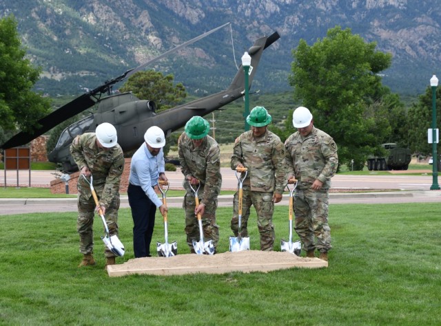 FORT CARSON, Colo. — Maj. Gen. David Doyle, center, commanding general, 4th Infantry Division and Fort Carson, along with Col. Erik Oksenvaag, right, Fort Carson garrison commander; Garrison Command Sgt. Maj. Jason R. Mortensen, left; retired...