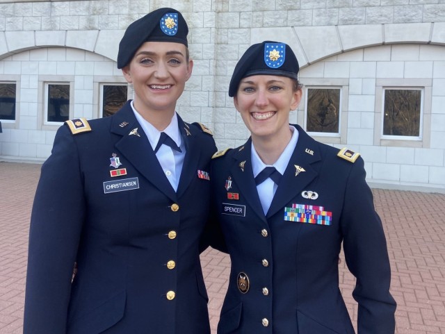 Maj. Kelly K. Spencer, right, poses for a photo following graduation from U.S. Army Command and General Staff College in 2022. Spencer has spent more than a decade living her dream as an Army nurse.  