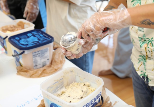 Soldiers from the 38th Air Defense Artillery Brigade serve ice cream to residents of the Sagamihara Minami Children's Home during an exchange event in Sagamihara, Japan, Aug. 14, 2024. The event allowed the soldiers to help the residents share their...