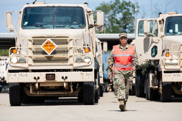 U.S. Army Sgt. Carmen Bargeron, a motor sergeant with the Fort Eisenhower-based 1148th Transportation Company, 110th Combat Sustainment Support Battalion, 78th Troop Command, Georgia Army National Guard, guides a M915A5 line-haul tractor truck...