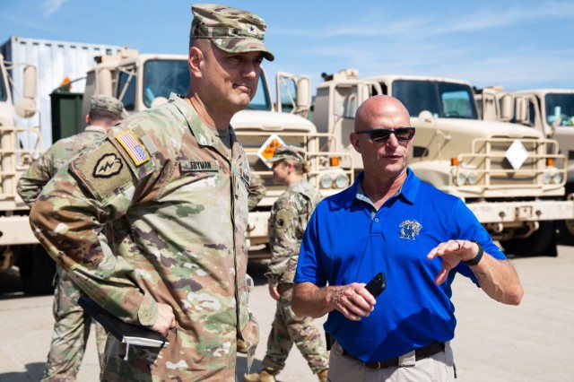 U.S. Army Brig. Gen. Jason Fryman, commanding general of the Georgia Army National Guard, speaks with William "Gunny" Bruce, Blue Grass Army Depot Training Coordinator, during Operation Patriot Press 2024 July 19, 2024, at the Blue Grass Army...